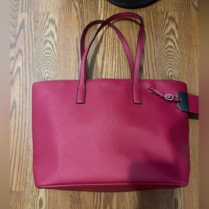 Mark Jacobs's pink purse with tags